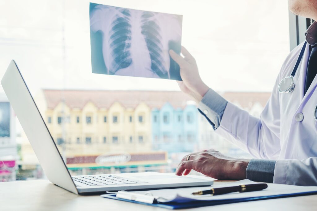 Doctor consulting with patient