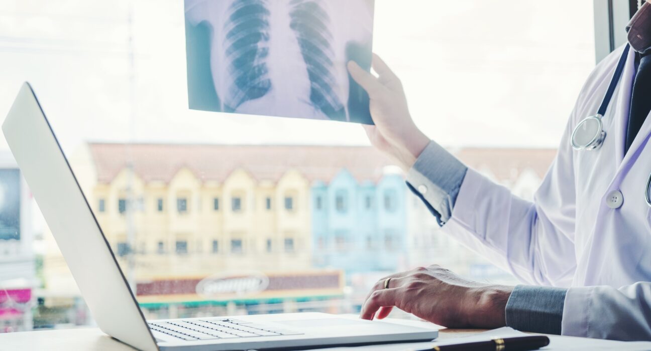 Doctor consulting with patient