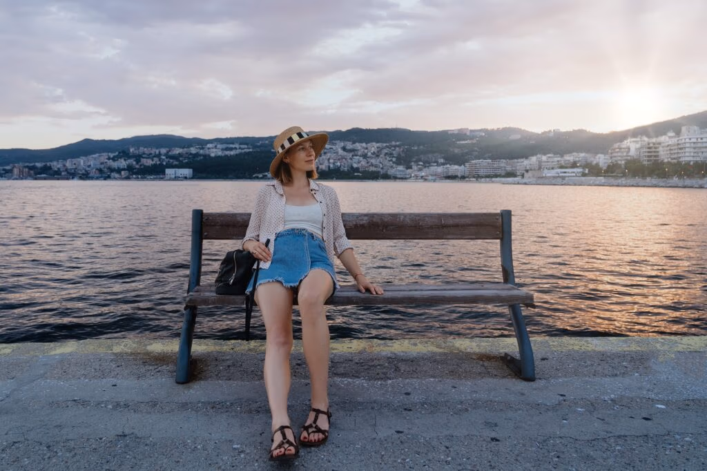 Pregnant woman relaxing near the sea