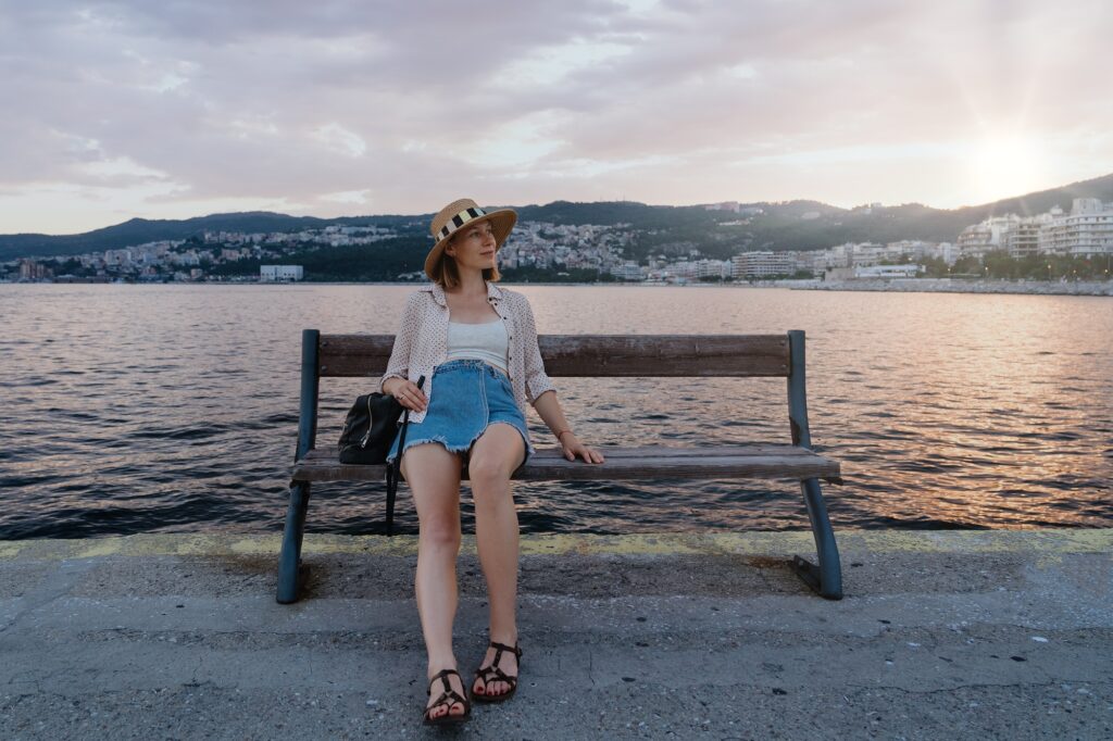 Pregnant woman relaxing near the sea