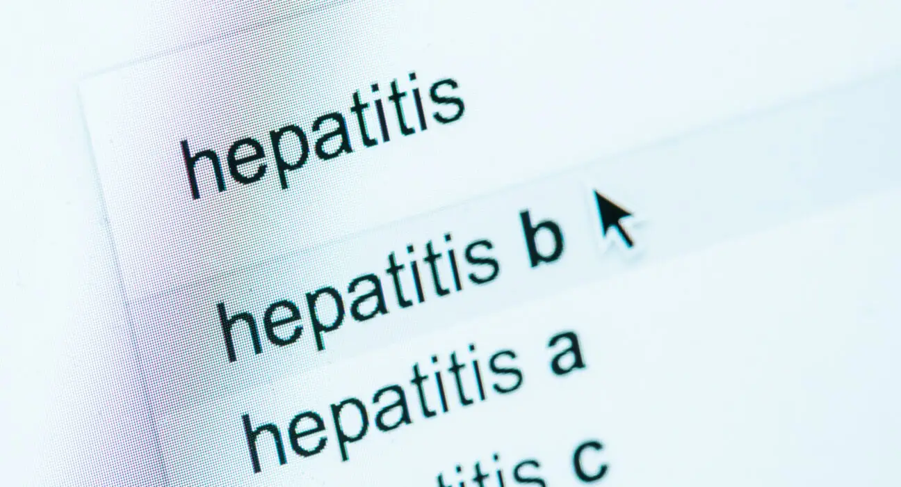 close up view of computer screen with lettering hepatitis a, b, c, world hepatitis day concept