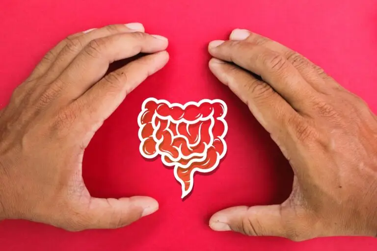 hand making a bracket with a gut icon in the middle