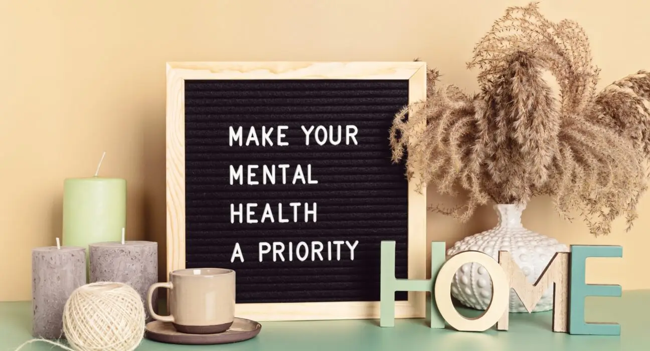 Make your mental health a priority motivational quote on the letter board. Inspiration psycological