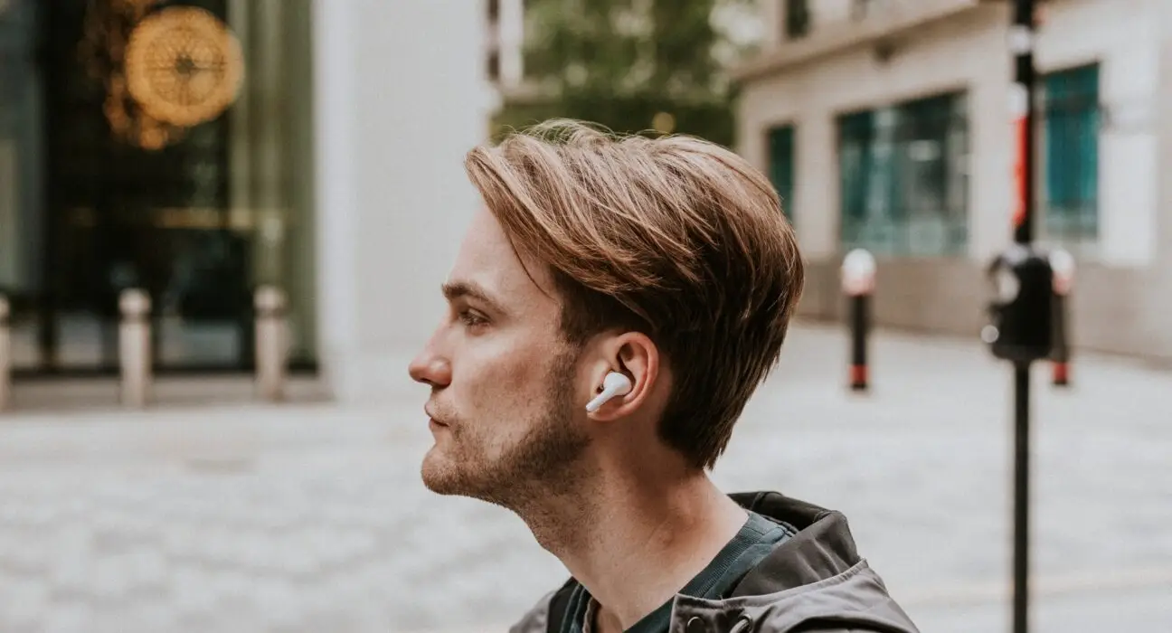 Man listening to music on his earphones