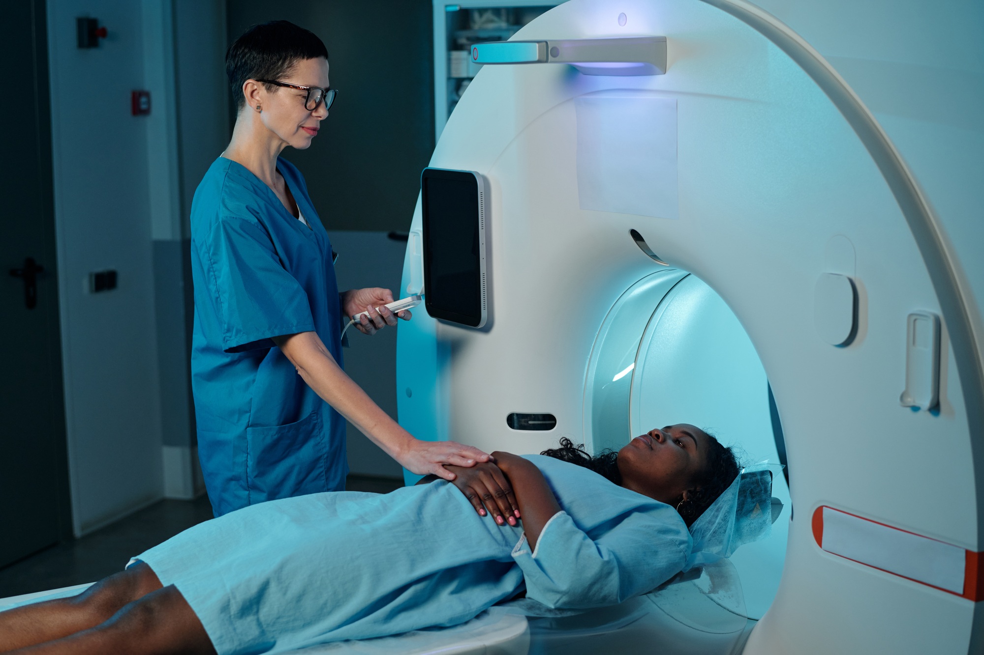 Conducting Medical MRI Scan with Professional Technician