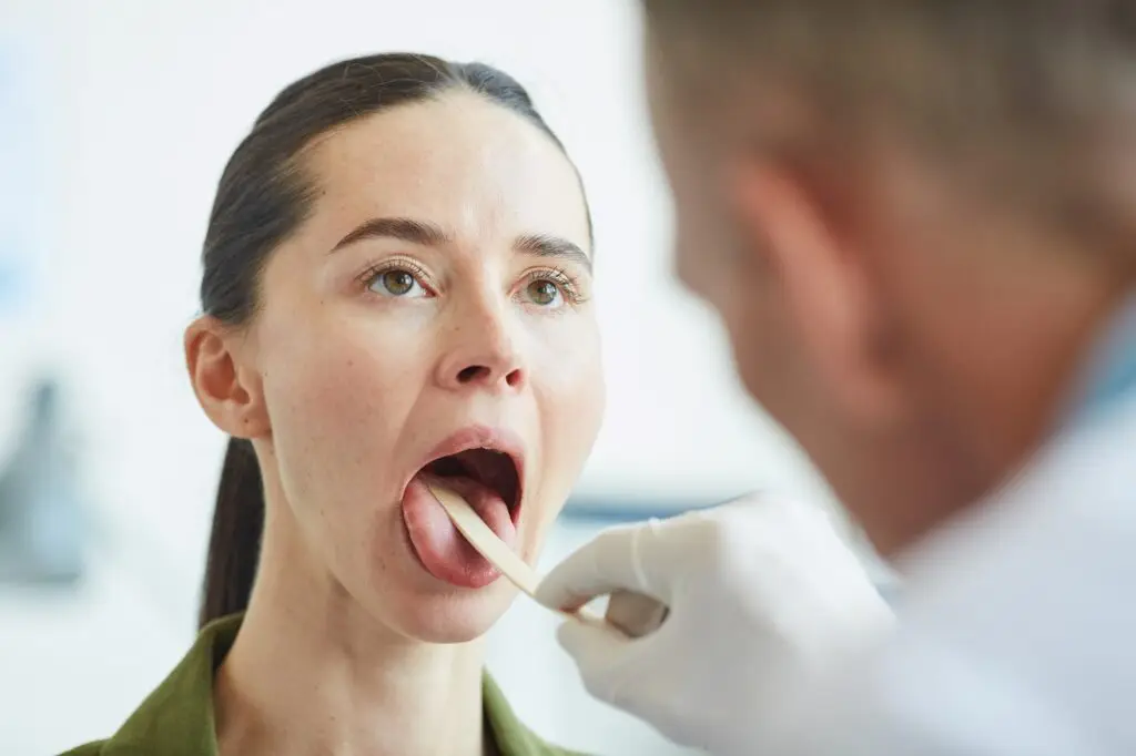Female Patient Opening Mouth